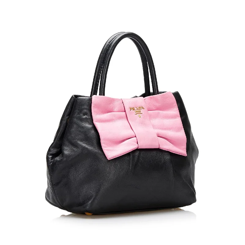 Prada bags with a snap - button closure and a decorative charm for a fashionable lookPrada Fiocco Bow Satchel 1XMdkd