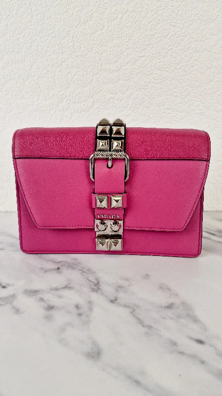 Prada Cleo bags with a curved shape and a chain - link shoulder strapPrada Elektra Crossbody Shoulder Bag in Pink Saffiano Leather & Smooth Leather With Studs - Clutch Rivets Flap Bag - Prada 1BD121