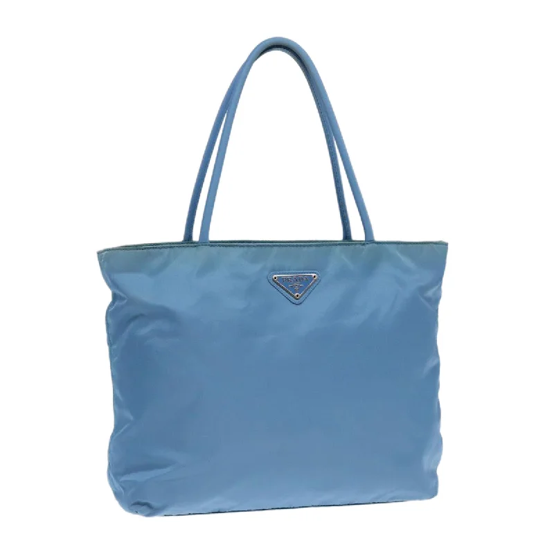 Prada Cahier bags with a leather - wrapped handle for a luxurious feelPRADA Hand Bag Nylon Blue Silver Auth cl856