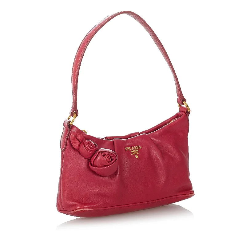 Prada bags with a snap - button closure and a decorative charm for a fashionable lookPrada Leather Baguette 26912