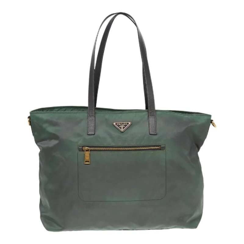 Prada Cleo bags with a contrast - colored interior for visual interestPRADA Tessuto Tote