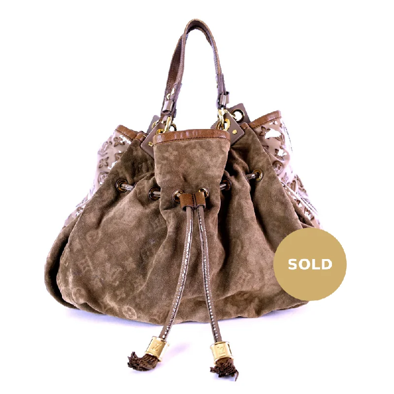 Louis Vuitton Twist bags with a contrast - colored interior for visual interestIrene Monogram Suede Hobo Bag