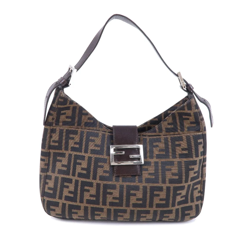 Fendi Baguette bags featuring the iconic FF logo plaque for a branded lookFENDI Zucca Canvas Leather Shoulder Bag Brown Black 26569