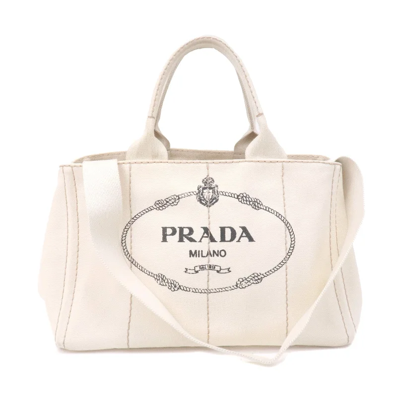 Ladies Prada Galleria bags with a textured leather surface for a more tactile lookPRADA Logo Canapa Canvas 2Way Tote Bag Ivory BN2642