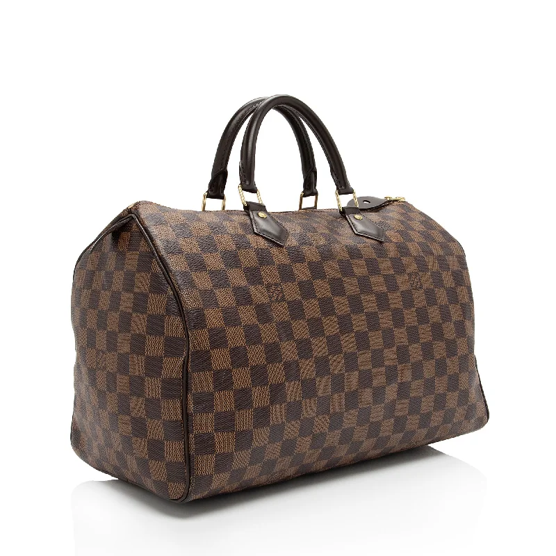 Ladies Louis Vuitton Petite Malle bags with a star - shaped charm for cutenessLouis Vuitton Damier Ebene Speedy 35 Satchel (gtaJsL)