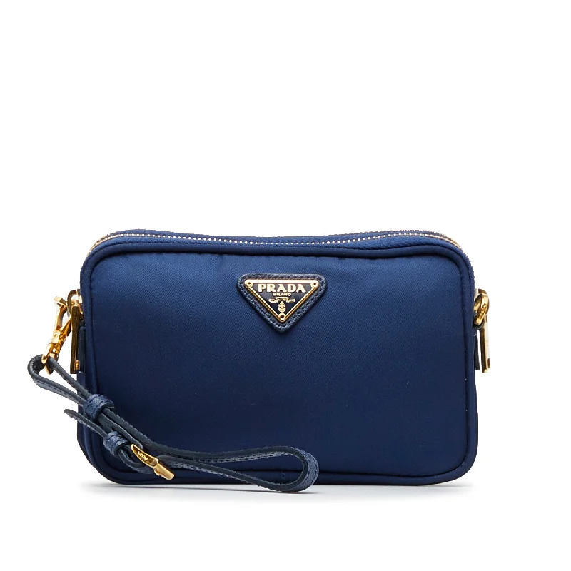 Prada Cahier bags featuring the signature triangular logo plaquePrada Tessuto Crossbody Bag Blue Nylon Canvas