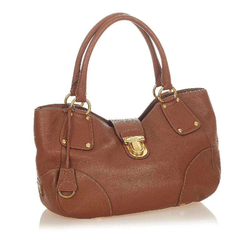 Prada tote bags with a double - handle and shoulder - strap option for easy usePrada Leather Handbag 31811