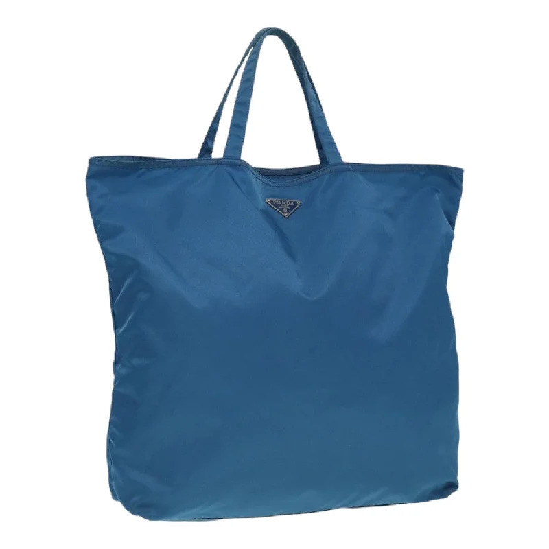 Ladies Prada Galleria bags with a textured leather surface for a more tactile lookPRADA Tote Bag Nylon Blue Silver Auth 87908