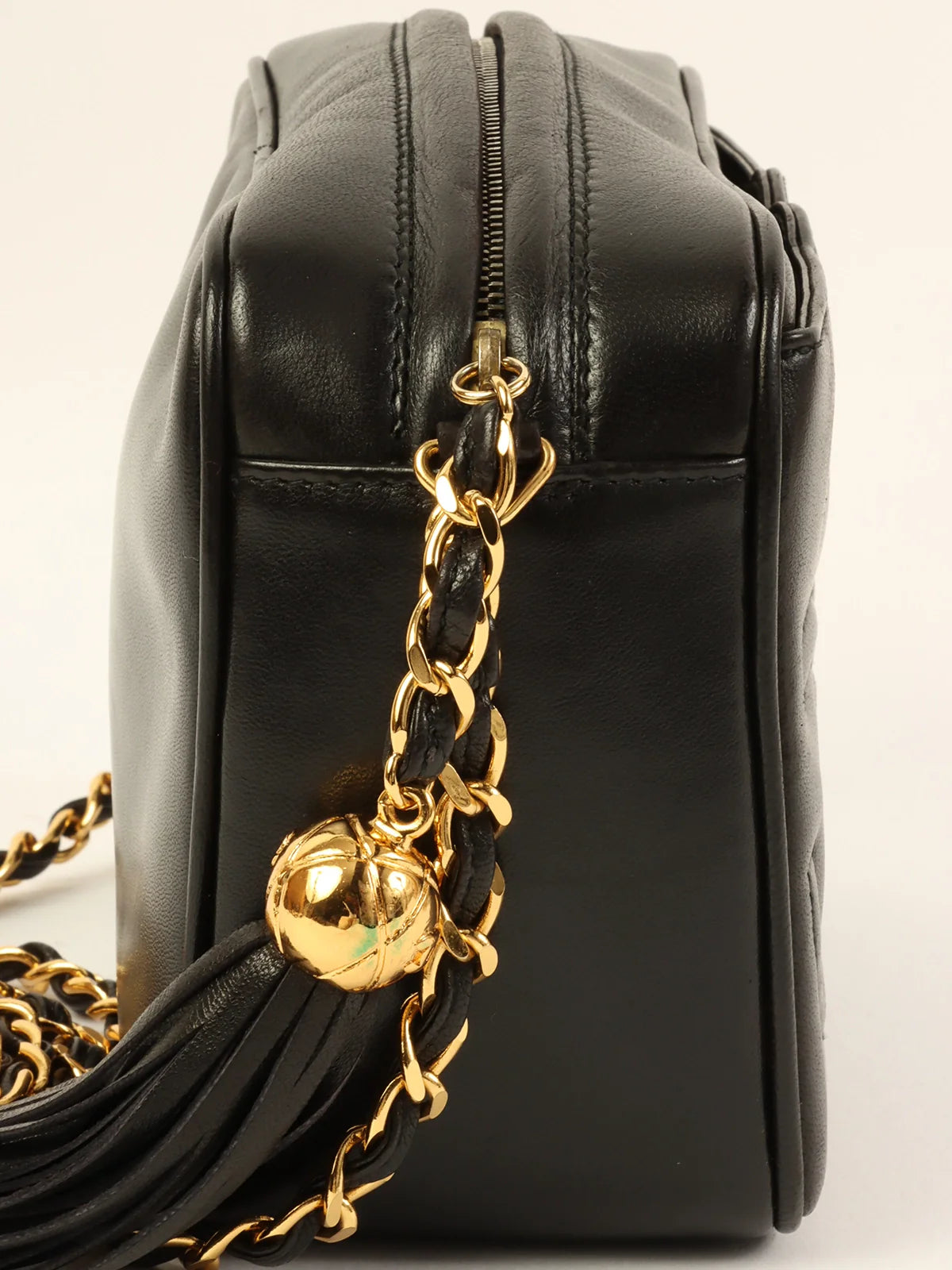 Chanel bags with iconic gold chainsCHANEL Around 1995 Made Triple Cc Mark Stitch Tassel Chain Shoulder Bag Black