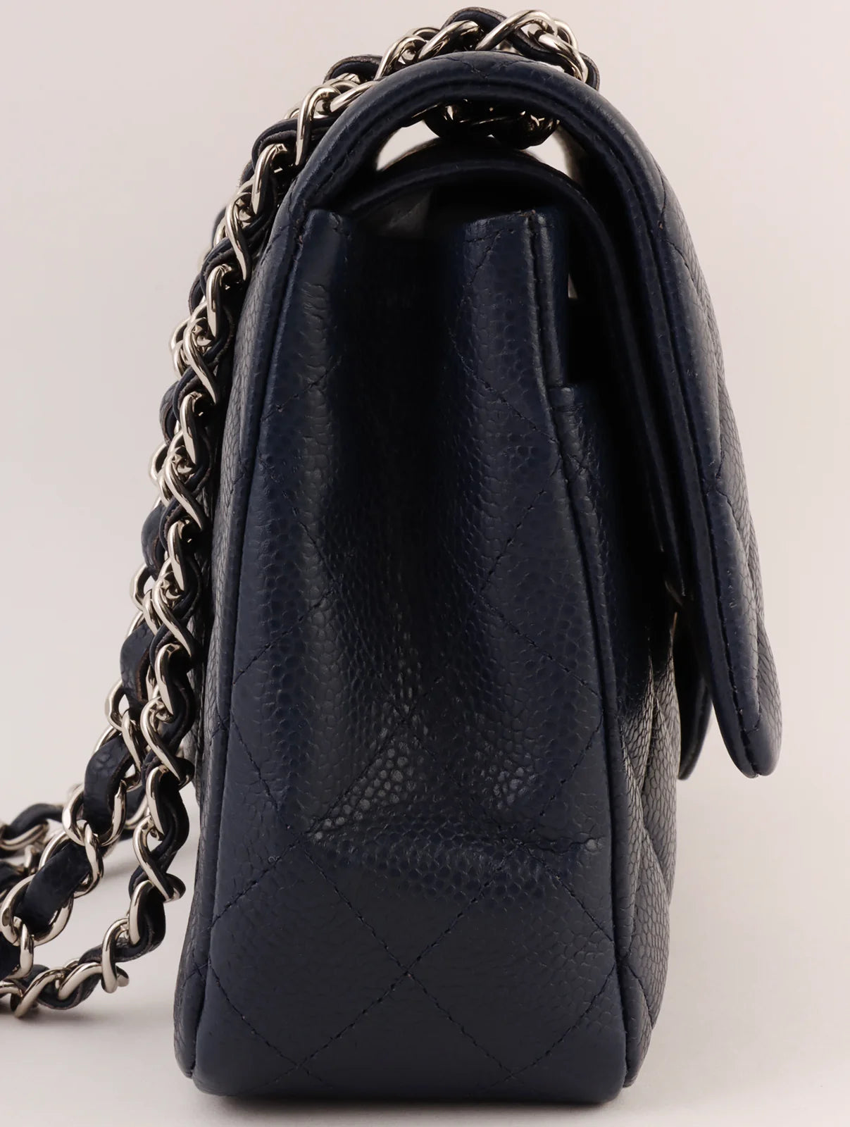 Chanel bags with gold, silver, and pearl accentsCHANEL Around 2014 Made Caviar Skin Classic Flap Chain Bag 25Cm Navy