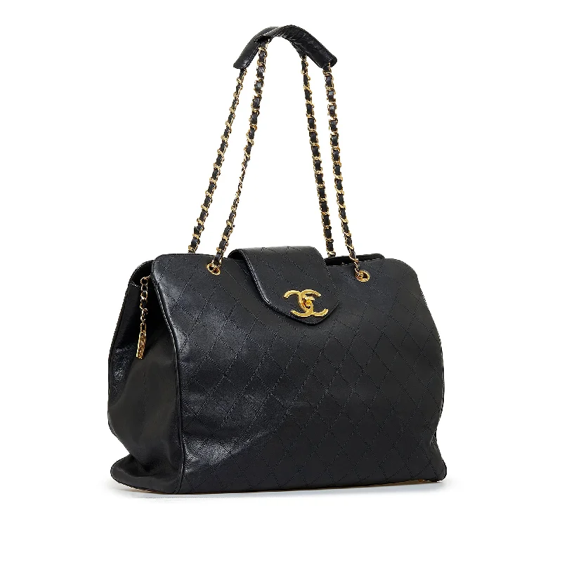 Chanel bags with intricate metal hardwareChanel Supermodel Weekender XL Black Lambskin Gold