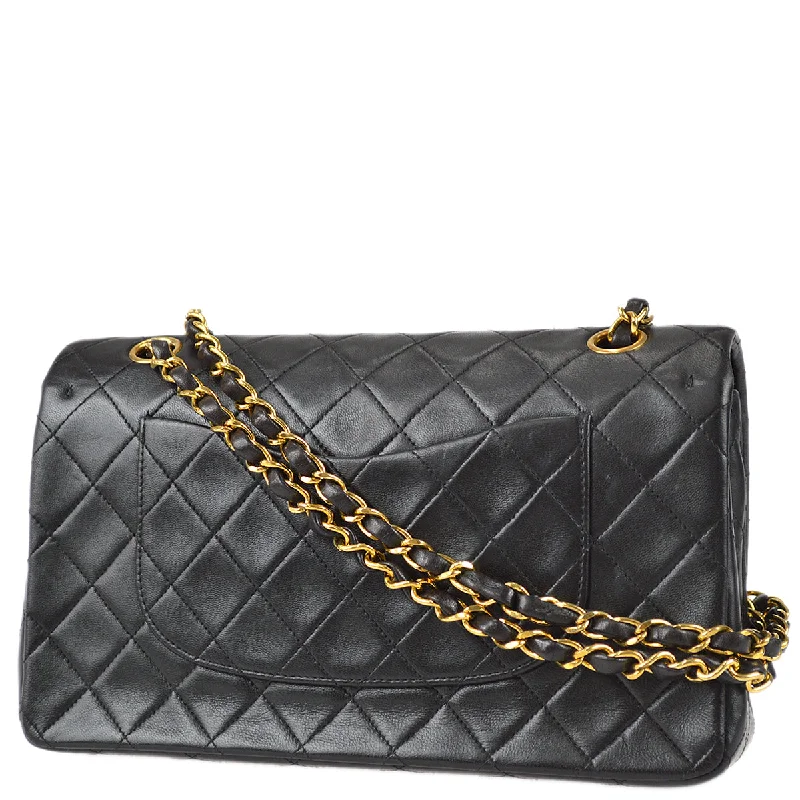 Chanel bags available at online luxury retaileChanel 1994-1996 Classic Double Flap Medium Shoulder Bag Black Lambskin