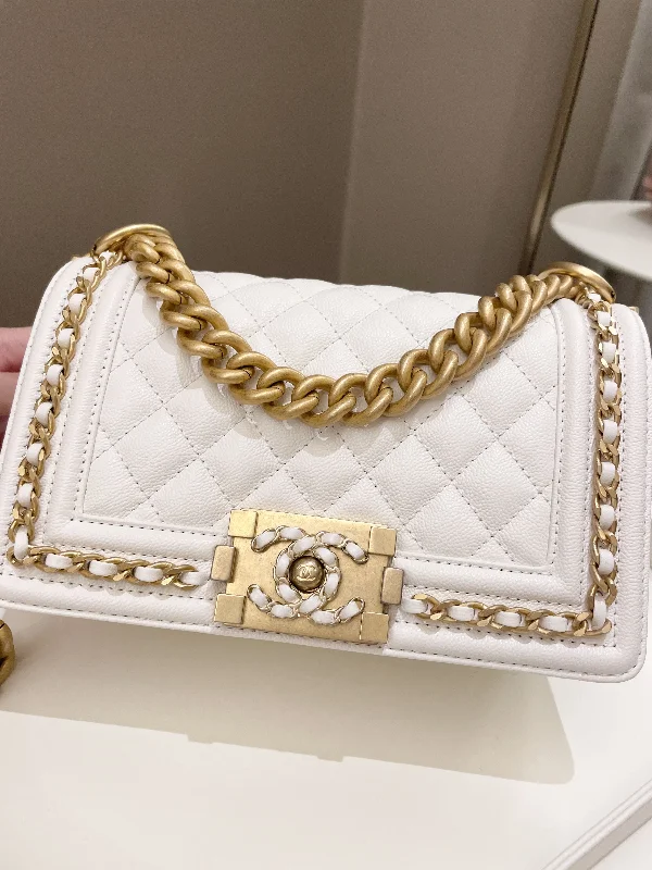 Chanel bags that pair perfectly with any outfitChanel Quilted Chain Around Small Boy White Ivory Caviar