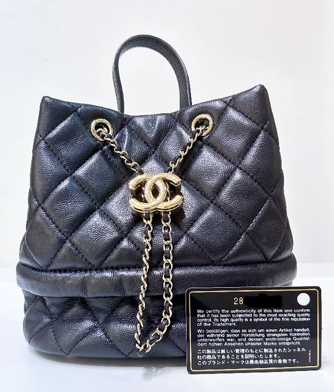 Chanel bags for women with minimalist styleCHANEL Caviar Quilted Rolled Up Bucket Drawstring Bag Black