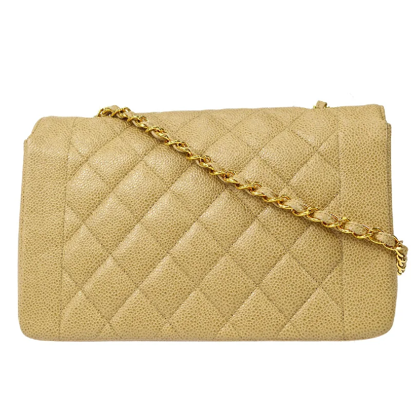 Chanel bags with gold, silver, and pearl accentsCHANEL 1994-1996 Diana Flap Medium Beige Caviar 77028