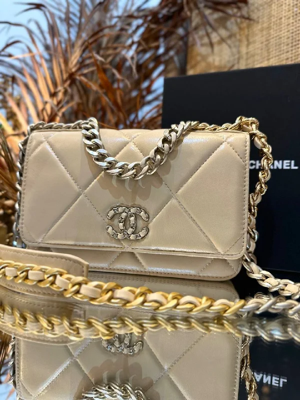 Chanel bags available at online luxury retaileGoatskin Quilted Chanel 19 Wallet On Chain WOC (Beige)