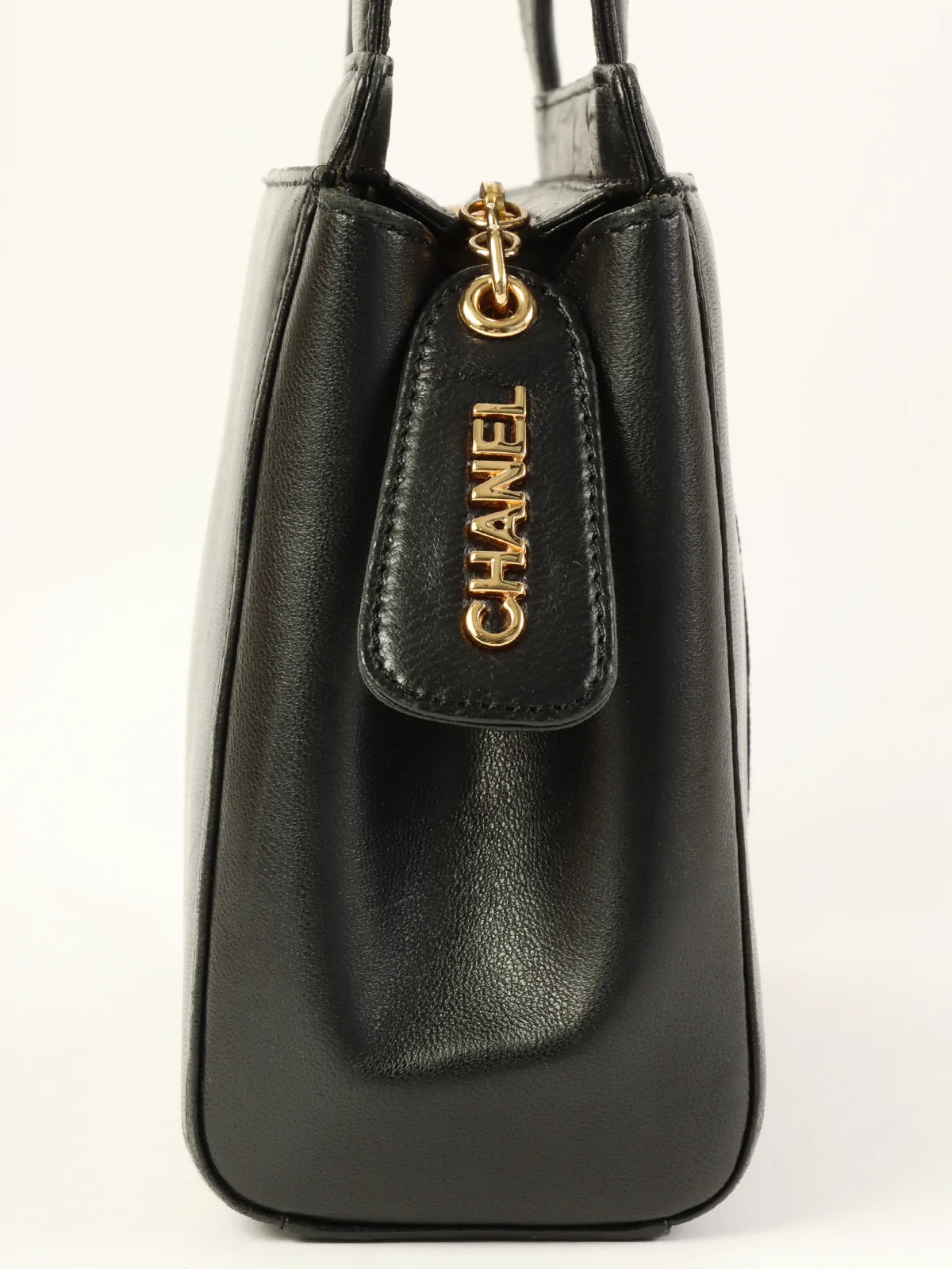 Chanel bags that pair perfectly with any outfitCHANEL Around 1998 Made Camellia Stitch Mini Top Handle Bag Black