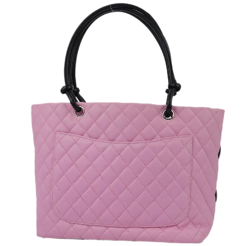 Chanel bags available in bold colors and patternsChanel Pink Calfskin Cambon Ligne Tote Handbag