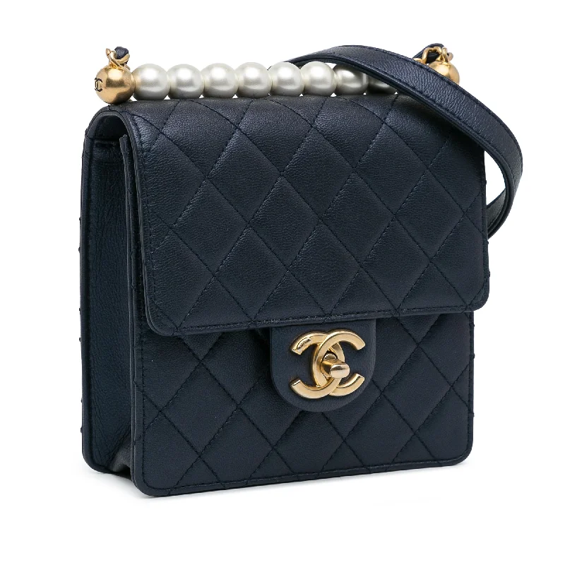 Chanel bags as wedding day accessoriesChanel Flap Bag Chic Pearls Blue Lambskin Gold