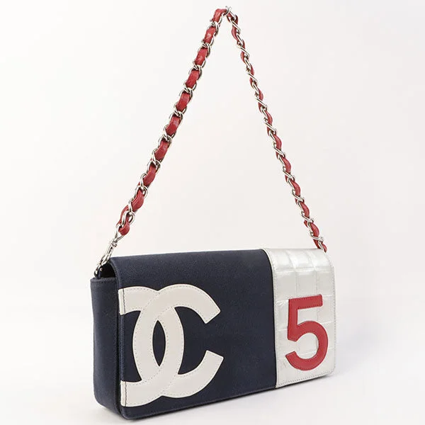 Chanel bags in luxury boutiques worldwideChanel Around 2002 Made Denim Chocolate Bar Cc Mark No.5 Stitch Chain Shoulder Bag Navy/Silver/Red