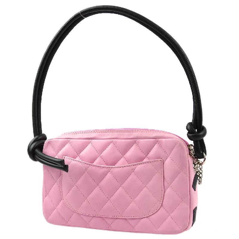 Chanel bags available at online luxury retaileChanel Pink Calfskin Cambon Ligne Handbag